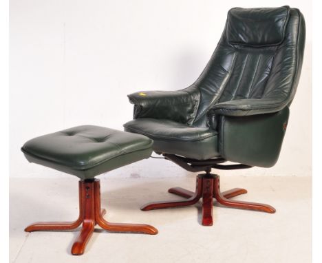 A vintage retro 20th century green PVC leather stress-less style Daneway recliner swivel chair. The armchair having a bentwoo