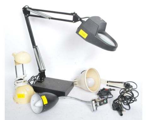 A collection of vintage 20th century mid century style desk lamps to include a large black LED magnifying lamp, a gooseneck w