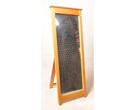 A vintage 20th century oak free standing cheval mirror having a rectangular mirror set with oak frame topped with a pediment 