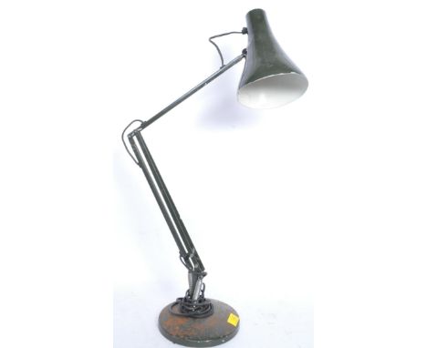 A retro vintage mid 20th century Herbert Terry Anglepoise lamp having a conical lightshade, three arm support raised on a cir