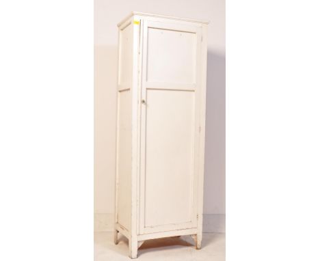 A vintage mid 20th century, 1950's&nbsp; painted kitchen larder. The cupboard having a flared chamfered top with a single two