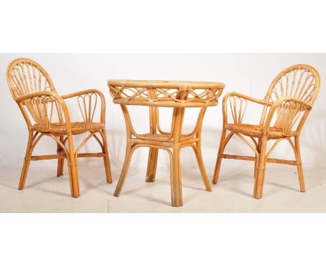 A mid 20th century 1960s Italian bamboo conservatory boho seating suite. In the manner of Franco Albini. The lot to include a