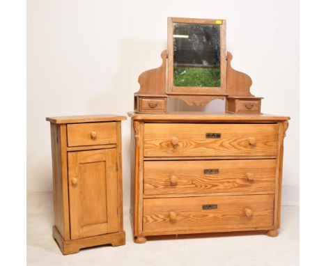 A vintage 20th century Scandinavian pine wood dressing table with mirror to top flanked by two drawers over a bank of three d