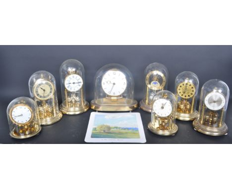 A collection of vintage 20th century anniversary clocks to include makers such as Hermle, Trinkle, Paico, Kundo. All having d