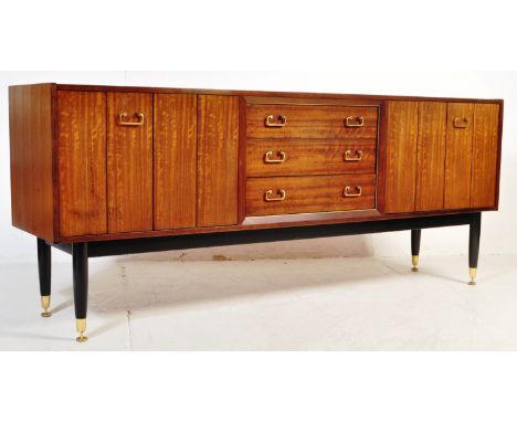 A retro vintage mid 20th century G Plan Tola &amp; Black sideboard credenza having a central bank of drawers flanked by two d
