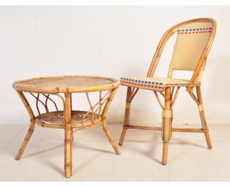 A vintage retro mid 20th century circa 1970's bamboo chair and occasional table. The table having a round table top over bent