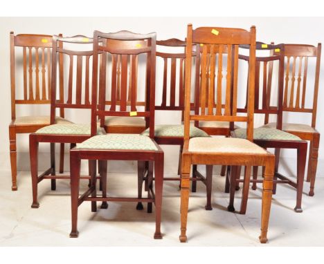 An assortment of vintage 20th century dining chairs to include teak and mahogany examples with upholstered cushion seat.