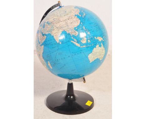 A vintage retro mid 20th century table top desk globe raised on a black circular base with swivel mount.&nbsp;