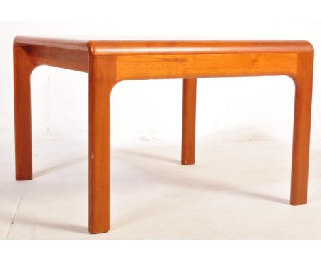 A retro vintage mid 20th century Danish solid teak coffee table having curved arches raised on upright supports. Measures app