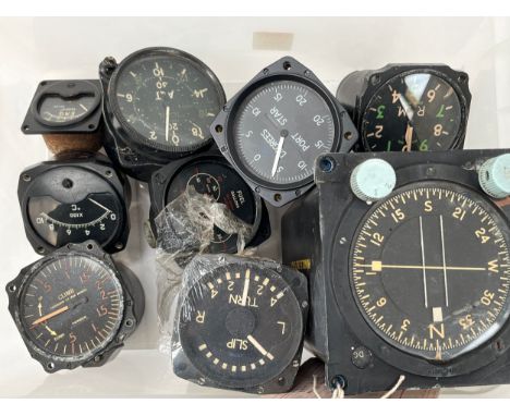 A collection of dials, mainly aircraft, including USA 1600-1M-B1 and Engine RPM 66/778 1944 