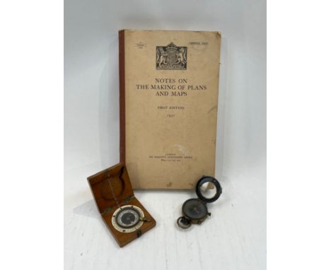 A WWI 1918 dated compass by J. Wardale &amp; Co., marked "H. Frost, Signals", a 1919 British Army marching compass, and an HM
