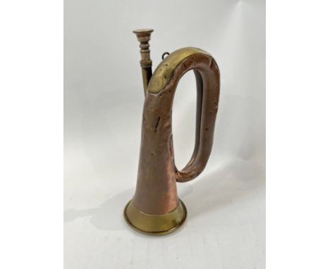 A WWI 1917 dated Boosey &amp; Co. military bugle 