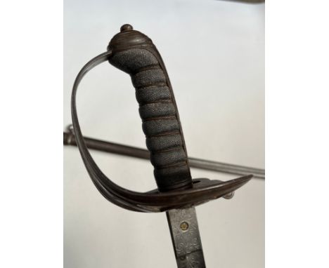 A Victorian 1827 pattern Rifle officer's sword, the blade engraved "Rifle Volunteers", shagreen wired grip, with steel scabba