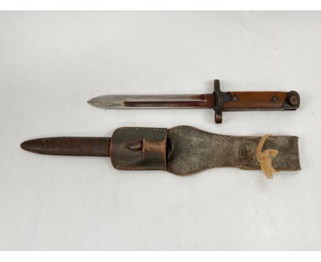 An Italian Baionetta M91/38, the grip stamped B63597, with M38 scabbard Type 1 and leather belt frog 