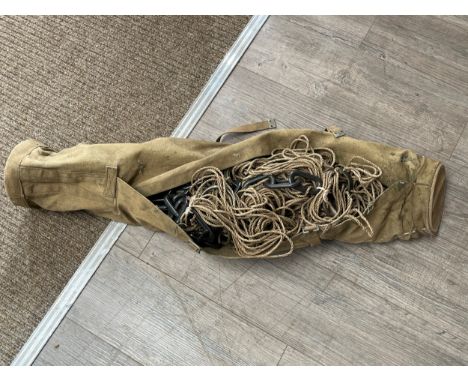 An Army antennae pole, webbing case 