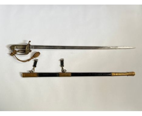 An 1827 pattern Naval Officer’s sword by Gieve and Sons of Portsmouth, ray skin grip, lion head pommel, brass hilt and scabba