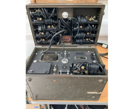 A WWII US Army Signal Corps Code Training set AN/65C-T1 with ten Morse code tappers, for training Morse code 