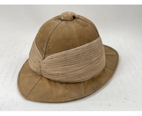 A WWI pith helmet, canvas covered, circa 1916, with SIGNALS RE lettering to front, Hobson &amp; Sons 