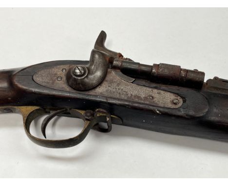 A Snider three band military rifle, the lock stamped VR Enfield with various stock and barrel inspector's stamps. ANTIQUE ITE
