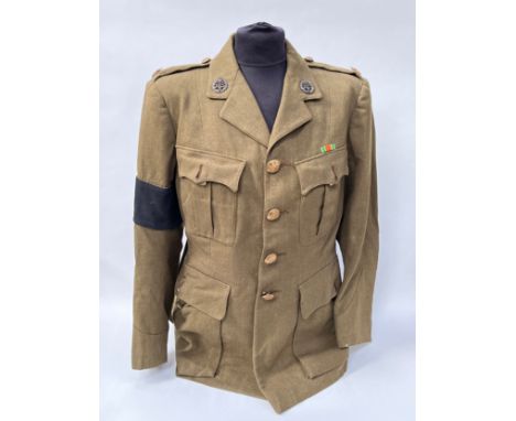 A WWII ATS uniform consisting of blouse and skirt, previously belonging to Florence Smith, who drove vehicles supporting fami