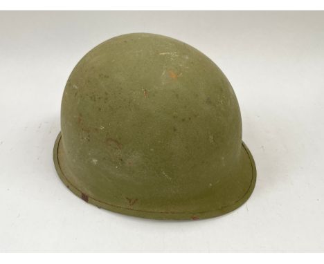 A post-war US Army helmet shell 