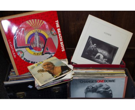 Vinyl records including Eurythmics, Erasure, Frankie Goes to Hollywood, David Bowie, Dire Straits, ELO, Barry White, Otis Rea