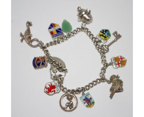 A silver and enamel charm bracelet