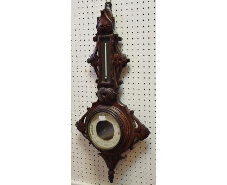 An oak banjo barometer.