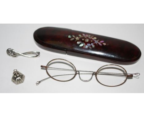 A silver Scottish Celtic bar brooch; a seal; a Victorian faux tortoiseshell glasses case and glasses