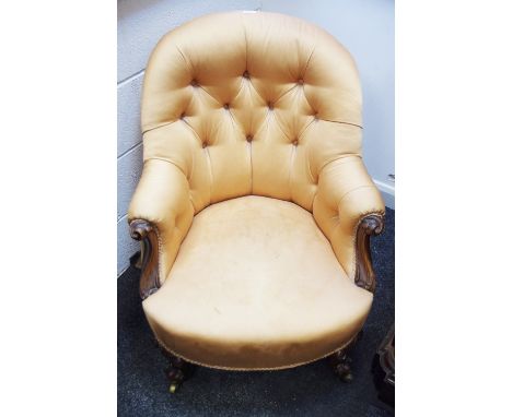A Victorian mahogany button back nursing chair.