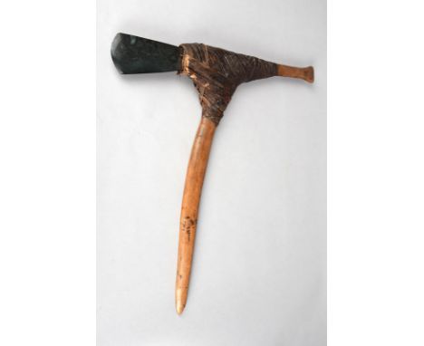 A Papua New Guinea axe Melanesia wood, greenstone blade and fibre binding, 51.5cm high, two Papua New Guinea bamboo pipes, wi