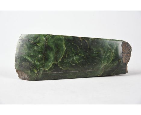A Maori adze blade toki pounamu New Zealand nephrite, one side with an incised line running almost the whole length, with han