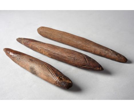 Three Eastern Highlands tapa beaters Papua New Guinea each part ribbed, 25cn and 32cm long. (3) Provenance Mary-Clare Adam, a