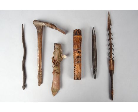 A Papua New Guinea sago beater Melanesia with leaf fibre binding to the palmwood and wood elements, 84cm long, a Massim adze,