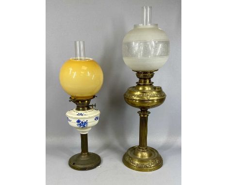 VICTORIAN BRASS OIL LAMP & ANOTHER, embossed with swags to the base and reservoir, veritas single burner, 45cms (h) excluding