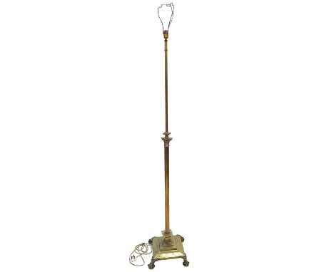 A brass telescopic standard lamp, circa 1900 Extended height 193cm, width 36cm.
