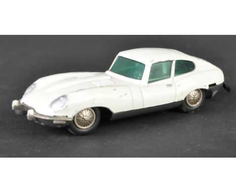 Jaguar - an original vintage Schuco made ' Mini Racer ' E Type Jaguar clockwork model / toy. White, with detailed body and me