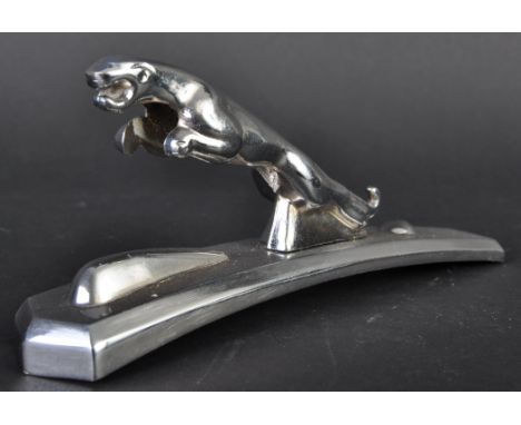 Jaguar Mascot - an original vintage Jaguar made Leaper car mascot, mounted on an unusual shaped bonnet mountable base. Simila