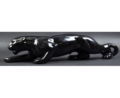 Jaguar - a large 20th century vintage c1970s ceramic lamp in the form of a Jaguar big cat. Prowling position, with the lamp f