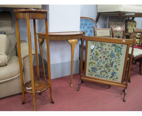 An Edwardian Style Jardiniere Stand, mahogany fire screen with a wool work panel, and a mahogany demi lune table. (3)