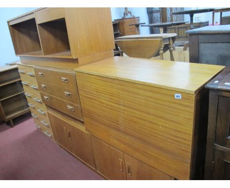 A G Plan Light Wood Sideboard, of rectangular form with double two door cupboards on plinth base, 162cm long, paper label to 