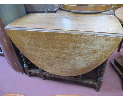 A 1920's Oak Gate Leg table, with barley twist legs.