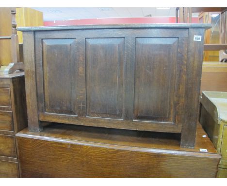 A 1930's Oak Blanket Box, with lift-up lid and three panel front, on stile feet, 89.5cm wide.