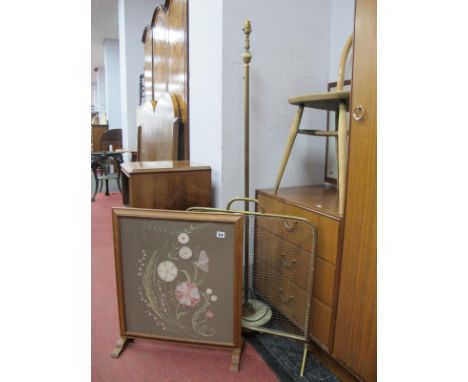 An Oak Firescreen, with embroidered panel; together with a brass firescreen and an onyx lamp standard.