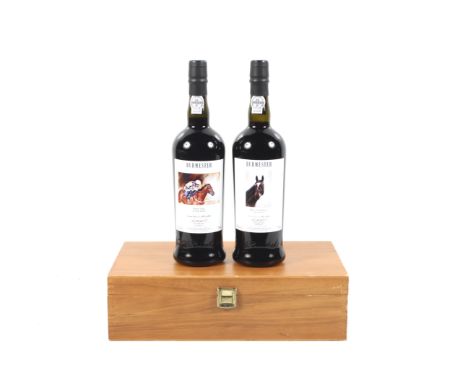 A collection of two bottles of Cheltenham Gold Cup commemorative port. Comprising one bottle of Burmester War of Attrition, 7