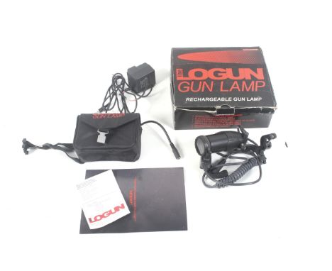 A Logan gun lamp. In original box. 