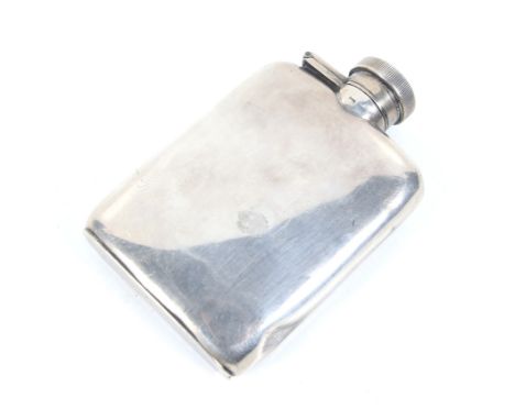 A small silver hip or spirit flask. With a hinged twist cap, mark of William Neale Ltd, Birmingham 1917, 9.25cm high overall 