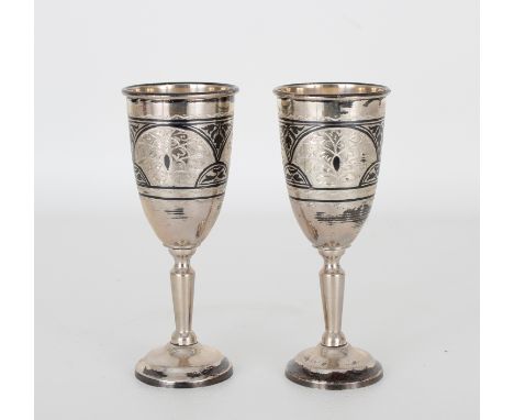 Russian Silver Kiddish Cups. Stamped on top rim. Height: 5 in.&nbsp;Total Weight: 6.08 ozt