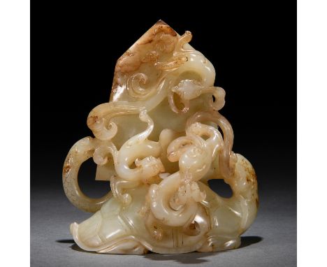 A Chinese Carved Jade Chilong Ornament H: 10cm; W: 9cm; 360g. Han dynasty.
