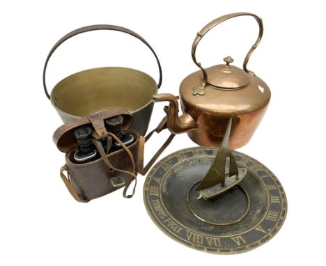 Brass jam pan with iron handle, brass sundial modelled as a boat, copper kettle and a pair of binoculars in case